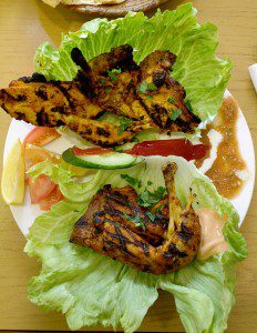 half grilled chicken