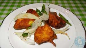 Chicken 65 - Marinated fried chicken fillet served with onions and peanut sauce £5