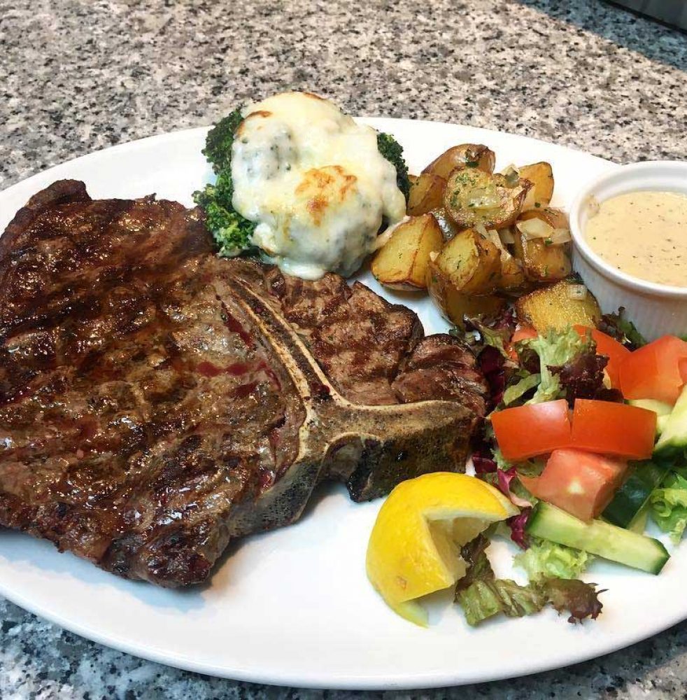 16oz grilled T-BONE steak with choice of sauce and side