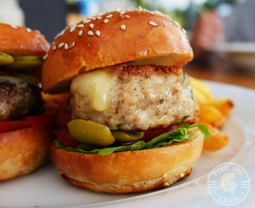 Chicken Burger – BBQ sauce, tomato, greenb salad, olive, cheddar, tempura fried basil.