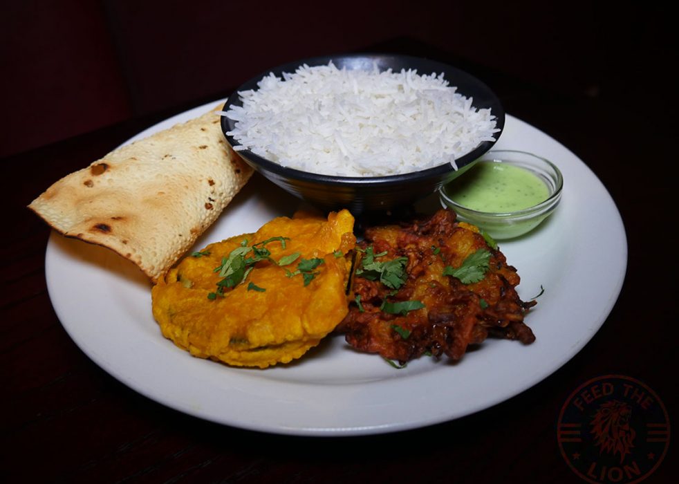 Rajas Dinner (with lamb, chicken, prawn £17 or veg £16) – Curry surved with rice, onion bahji, aubergine pakora, papadum and lime chutney